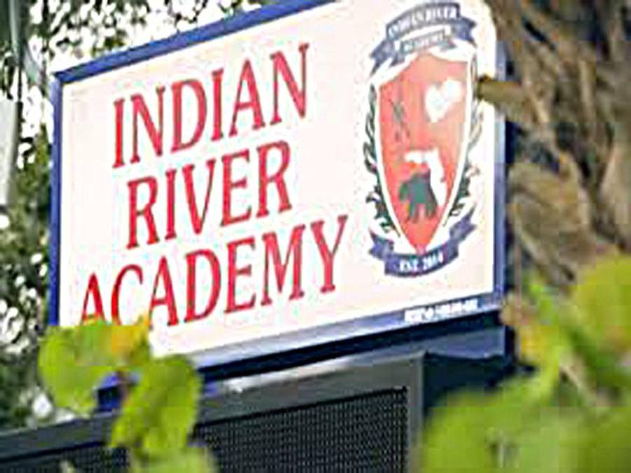 Indian River Academy sign at school
